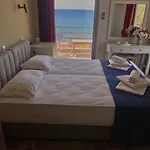 De La 2* Koróni